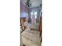 Bathroom with a classic white toilet and bathtub at 10128 Paradise Blvd, Treasure Island, FL 33706