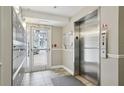 Building hallway with mailboxes and elevator access at 210 5Th S Ave # 307, St Petersburg, FL 33701