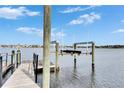 Private dock with lift provides convenient water access at 5253 Brighton Shore Dr, Apollo Beach, FL 33572