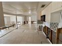 Under renovation kitchen with tiled floors at 6437 1St Palm Pt, St Pete Beach, FL 33706