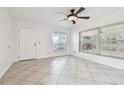 Bright room with neutral colors and ample natural light beaming through the window at 15107 Morning Dr, Lutz, FL 33559