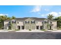 New townhome community with 4-unit buildings, 2-car garages, and attractive landscaping at 226 Royal Spoonbill Dr, Ruskin, FL 33570