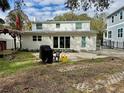 Large backyard with patio, grill, and space for outdoor entertaining at 4826 W San Jose St, Tampa, FL 33629