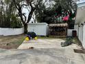 Spacious backyard with a shed, patio, and grilling area at 4826 W San Jose St, Tampa, FL 33629