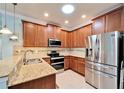Well-equipped kitchen with stainless steel appliances at 5527 Sunset Falls Dr, Apollo Beach, FL 33572