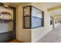 Condo entrance with wreath and window at 5849 Park N St # 201, St Petersburg, FL 33709