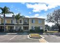 Front of two-story townhome with parking at 10805 Keys Gate Dr, Riverview, FL 33579