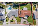 Aerial view of single Gathering home with pool and large yard at 1235 Cordova Ne Blvd, St Petersburg, FL 33704