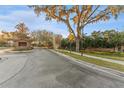 Stonewood community entrance, featuring a guardhouse and signage at 125 Falling Water Dr, Brandon, FL 33511