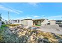 Mobile home backyard with storage shed and patio area at 322 S Port Royal Ln, Apollo Beach, FL 33572