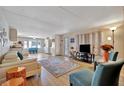 Open living room with light flooring and comfortable seating at 322 S Port Royal Ln, Apollo Beach, FL 33572