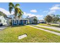 Newly renovated home with a large yard and brick paver driveway at 3621 19Th Street N, St Petersburg, FL 33713