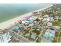 Aerial view of beach house close to the ocean at 106 7Th Ave, St Pete Beach, FL 33706