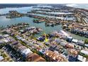 Aerial view showing the house's location in a waterfront community at 189 175Th E Ave, Redington Shores, FL 33708