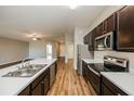 Modern kitchen with stainless steel appliances and island at 5127 Tower St, North Port, FL 34291