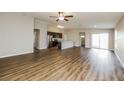 Spacious living room with hardwood floors and access to patio at 5127 Tower St, North Port, FL 34291