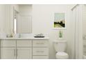Clean bathroom with white cabinets, quartz countertop, and shower/tub combo at 9366 Runaway Breeze Dr, Land O Lakes, FL 34637