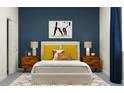 Bedroom with wood nightstands and yellow pillows at 9706 Minnow Ray Dr, Land O Lakes, FL 34638