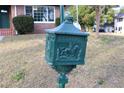 Close-up of an ornate green mailbox with horse detail at 36847 Jefferson Ave, Dade City, FL 33523