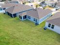 This home boasts a spacious backyard, perfect for outdoor entertaining at 711 Old Windsor Way, Spring Hill, FL 34609