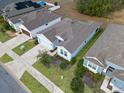 Attractive single story home with a two-car garage and well maintained lawn at 711 Old Windsor Way, Spring Hill, FL 34609