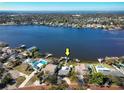 Aerial view of waterfront home and neighborhood at 743 Chesapeake Dr, Tarpon Springs, FL 34689