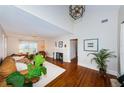 Spacious living room featuring a fireplace and hardwood floors at 136 16Th Ne Ave, St Petersburg, FL 33704