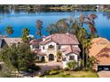 Luxury home on the lake with a large backyard and beautiful landscaping at 1903 Haven Bend, Tampa, FL 33613