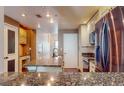 Modern kitchen with granite countertops and stainless steel appliances at 200 4Th S Ave # 139, St Petersburg, FL 33701