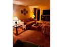 Bright living room with comfy seating and a coffee table at 4031 Cluster Dr, Holiday, FL 34691