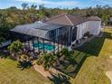 Aerial view of home showcasing pool and cabana at 9401 93Rd St, Seminole, FL 33777