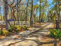 Private gated entrance to Hope Estate property at 19256 Hidden Oaks Dr, Brooksville, FL 34604