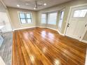 Bright living room with hardwood floors and bay window at 2720 9Th N Ave, St Petersburg, FL 33713