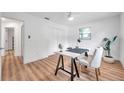 Bright home office features wood flooring and built-in shelving at 3445 10Th N Ave, St Petersburg, FL 33713