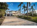 Two-story home with a grand entrance and lush landscaping at 4419 Bayshore Ne Blvd, St Petersburg, FL 33703