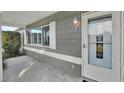 Front door and covered porch at 5971 52Nd N Ave, Kenneth City, FL 33709