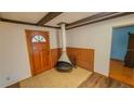 Living room with fireplace and wood flooring at 616 2Nd Nw Ave, Largo, FL 33770
