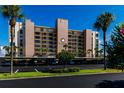The Commodore 7700 building exterior at 7700 Sun Island S Dr # 702, South Pasadena, FL 33707