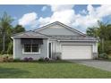 One-story home with gray siding, white garage door, and landscaping at 11683 Rose Gold Ct, Venice, FL 34293