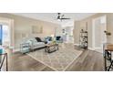 Bright and airy living room with a neutral color palette and stylish furniture at 12918 Cambridge Ave, Tampa, FL 33624