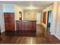 Simple dining area with wood-paneled walls at 21732 Bell Lake Rd, Land O Lakes, FL 34639