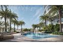 Resort-style pool with plenty of lounge chairs and tropical landscaping at 805 S Gulfview Blvd # 607A, Clearwater, FL 33767