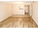 Bright dining area with tile flooring and view to living room at 946 Virginia St # 102, Dunedin, FL 34698