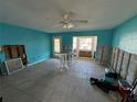 Under construction living room with teal walls at 225 174Th E Ave, Redington Shores, FL 33708