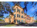 Building exterior showcasing attractive architectural details and landscaping at 2738 Via Tivoli # 220B, Clearwater, FL 33764