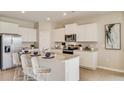 Spacious kitchen featuring granite countertops and stainless steel appliances at 3836 Turning Tides Ter, Bradenton, FL 34208