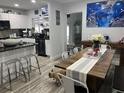 Open concept kitchen with breakfast bar and dining area at 1202 W Camellia Dr, Brandon, FL 33510