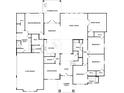 Open floor plan with 3-car garage, spacious kitchen, and media room at 13510 Haflinger Way, Hudson, FL 34667