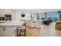 Modern kitchen with white cabinets and quartz countertops at 16750 Gulf Blvd # 413, North Redington Beach, FL 33708