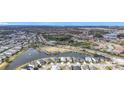 Wide shot of the community with lake and surrounding area at 5629 Maidenstone Way, Palmetto, FL 34221